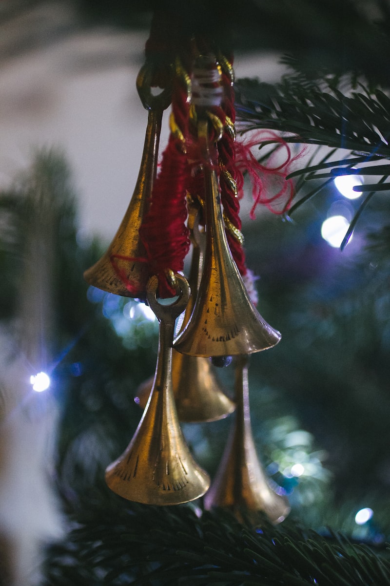 selective focus photography of trumpet baubles